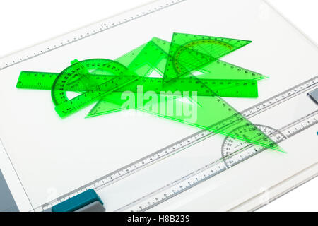 drawing board with measuring instruments on a white background Stock Photo