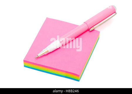 pen on sticky note on a white background Stock Photo