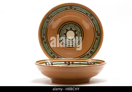 ceramic tableware with an ornament in a rustic style Stock Photo