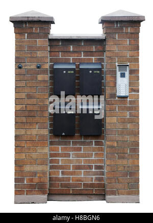Standard metal mailboxes and the electronic panel of home protection and control  hang on a brick wall. Isolated with patch Stock Photo