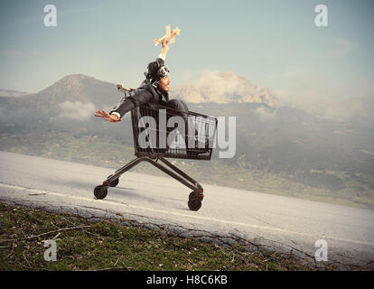 Crazy businessman like a child Stock Photo