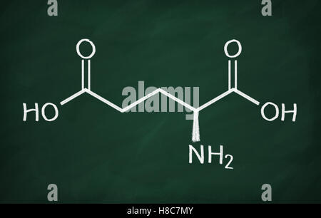 Structural model of Glutamic Acid on the blackboard. Stock Photo