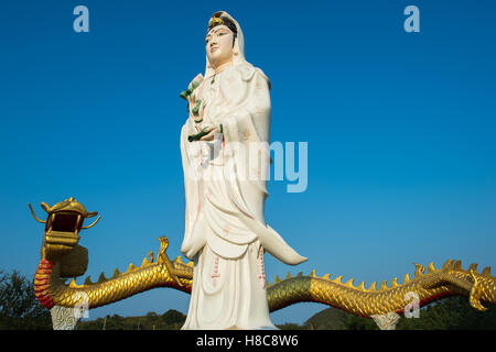 Statue of bodhisattva Guanyin goddess of mercy outside Pranburi south of Hua Hin, Thailand Stock Photo