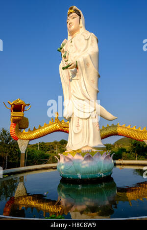 Statue of bodhisattva Guanyin goddess of mercy outside Pranburi south of Hua Hin, Thailand Stock Photo