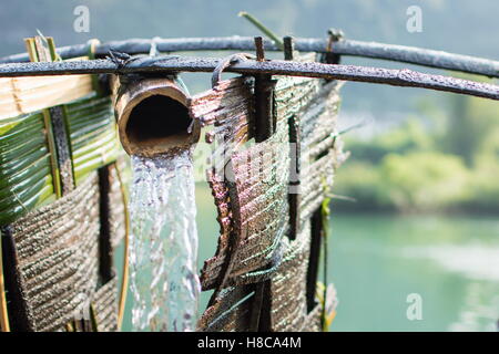 Old wooden watermill close up. Power of nature Stock Photo