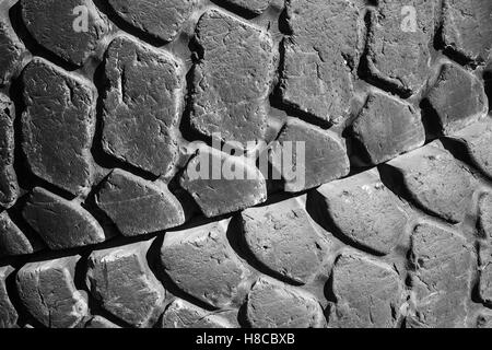 Old used truck wheels lay in stack, tires pattern Stock Photo