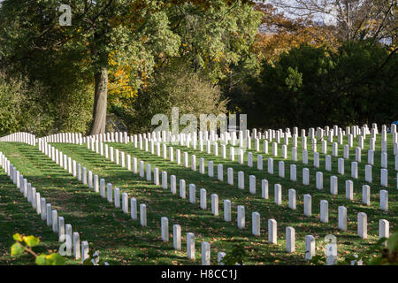 Gravestones at the Cypress Hills National Cemetery in Brooklyn in New York on Saturday, November 5, 2016. The cemetery is the only U.S. National Cemetery in New York City with over 21,100 internments. Opened in 1862, it is currently closed to new internments having filled up space in 1954.  Spouses of the interned are still going on as they are in the same grave.  (© Richard B. Levine) Stock Photo