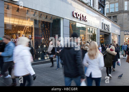 Costa Coffee shop & Christmas windows appear in Next stores in the streets of  Liverpool One as Saturday shoppers hunt for festive presents, Liverpool city centre, Merseyside, UK Stock Photo