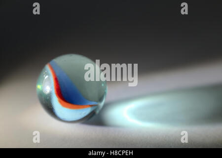 Marble with light reflections and caustics seen on the ground. Stock Photo