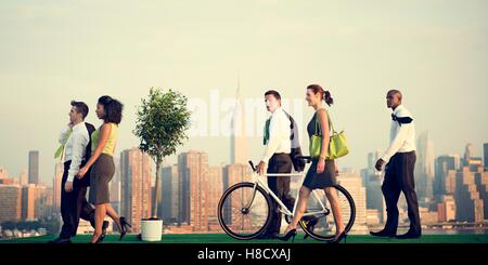Business Man Woman Pushing Bike Concept Stock Photo