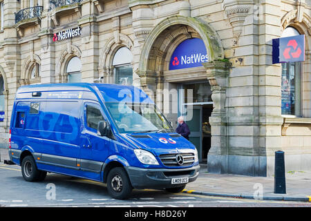 G4S Security cash collection and transfer outside Nat West Bank, Southport, Merseyside, UK Stock Photo
