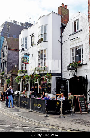 The Cricketers pub with people drinking outside in The Lanes area of Brighton UK Stock Photo