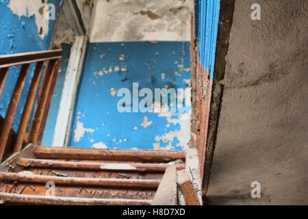 very old dilapidated dangerously unstable crumbling house Stock Photo