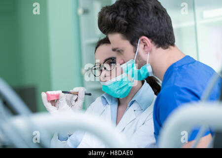 Students with dental prosthesis, dentures, prosthetics work. Stock Photo