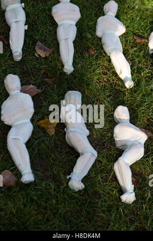 Bristol, UK. 11th Nov, 2016. Artist Rob Heard's hand-stitched shrouded figures represent the 19,240 killed on the first day of the Somme in 1916. Laid out on College Green Bristol in front of cathedral and City Hall. Credit:  Rob Hawkins/Alamy Live News Stock Photo