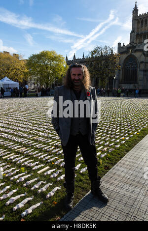 Bristol, UK. 11th Nov, 2016. Artist Rob Heard in front of Bristol Cathedral and his Shrouds of the Somme exhibition Credit:  Rob Hawkins/Alamy Live News Stock Photo