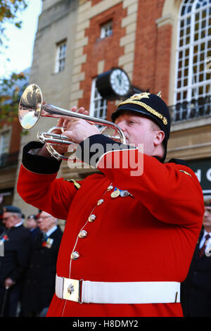 Peterborough, UK. 11th Nov, 2016. Armistice Day. A bugler from the Royal Anglian Regiment prepares to play The Last Post at eleven o'clock. People marking Armistice Day in Peterborough, UK. A two-minute silence is held across the country on the eleventh hour of the eleventh day in the eleventh month, marking the end of the First World War.  Credit:  Paul Marriott/Alamy Live News Stock Photo