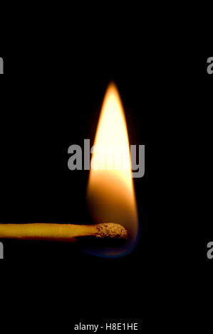 Burning Match Macro Closeup, Vertical Isolated On Black Stock Photo