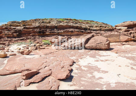 Pot Alley landscape with rugged, eroded red sandstone rock formations on the coral coast in Kalbarri, Western Australia. Stock Photo