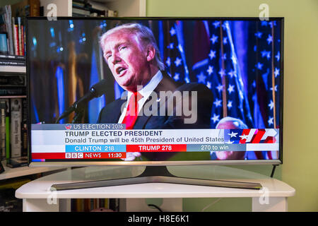 UK - NOV 9TH 2016: A shot of a TV showing the BBC News channel with live breaking news that Donald Trump is elected President. Stock Photo