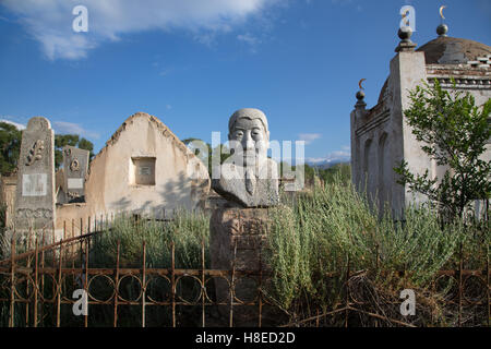 Kyrgyzstan - cemetery in Kochkor, Naryn Province  -  Travel people Central Asia Stock Photo