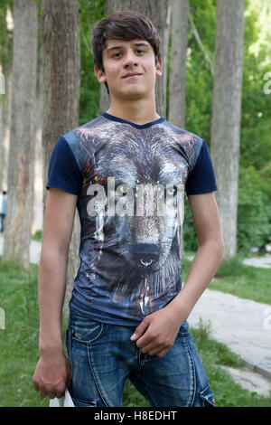 Portrait of Pamiri people - young man posing in park of Khorog - GBAO province - Tajikistan Stock Photo