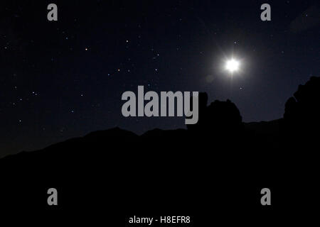 Night Photography Landscape of stars and moon in the dessert in Fossil Falls, California Stock Photo