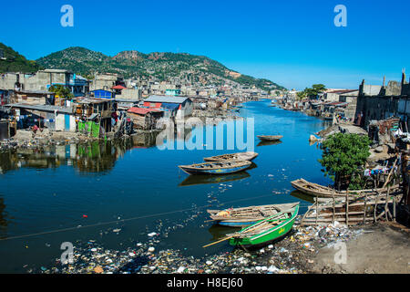 Totally polluted River Mapou flowing through Cap Haitien, Haiti, Caribbean, Central America Stock Photo