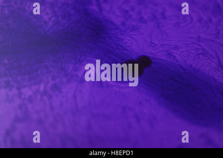 purple abstract paint in water pattern Stock Photo