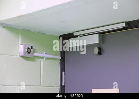 Closeup Of An Automatic Magnetic Door Release System For A