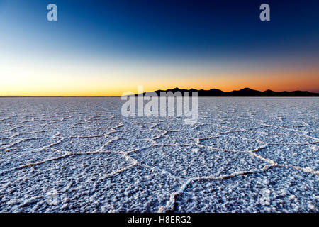 Sunrise at the Salar de Uyuni in Bolivia, South America; Concept for travel in Bolivia and South America Stock Photo