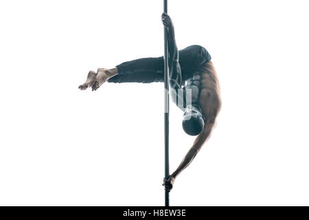 Male pole dancer with body-art on pylon Stock Photo