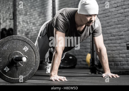 Pushup workout in gym Stock Photo