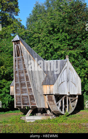 13th-century medieval wooden tread wheel crane with 2 tread wheels used for building castles and cathedrals in Bruges, Belgium Stock Photo