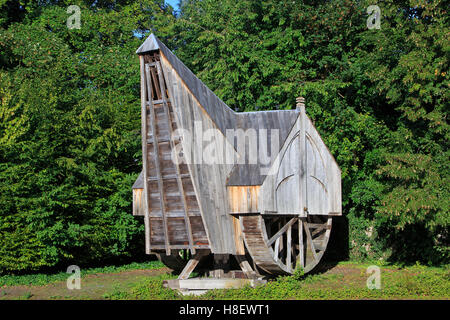 13th-century medieval wooden tread wheel crane with 2 tread wheels used for building castles and cathedrals in Bruges, Belgium Stock Photo