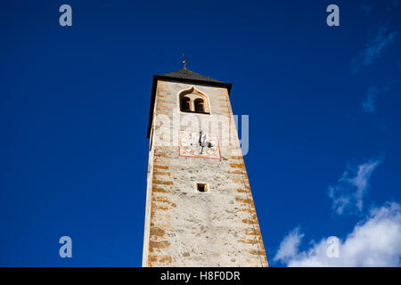 Small church and tower bell in Valle San Silvestro village on Alps mountains, Italy Stock Photo