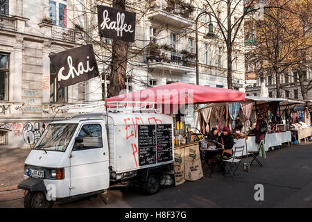 View of mobile cafe at weekly Eko-Markt, or Eco-Market, at Kollwitzplatz in gentrified Prenzlauer Berg neighbourhood of Berlin , Stock Photo