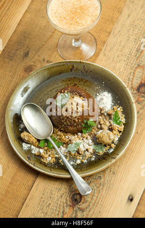 Ethicurian sticky toffee apple cake pudding. a UK food Stock Photo