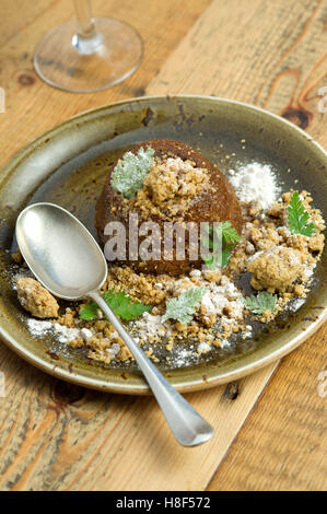 Ethicurian sticky toffee apple cake pudding. a UK food Stock Photo