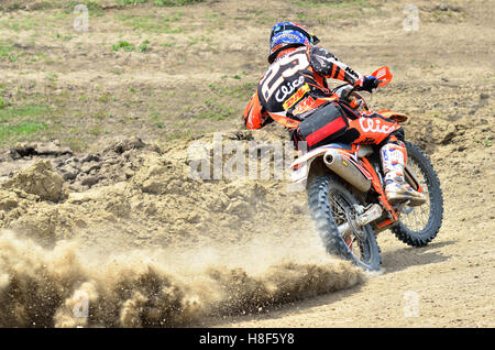 BUZAU, ROMANIA - JUNE 15: An unidentified rider participates in the World Endurocross Championship on June 15, 2013 at Maracinen Stock Photo