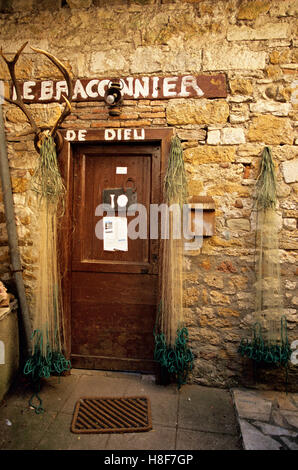 Strangely named house 'Le braconnier de Dieu', 'God's poacher', in the village of Carennac, Lot, France, Europe Stock Photo