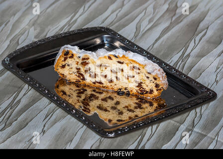 Single slice of Dresdner Christmas Stollen (traditional German Christmas cake) Stock Photo