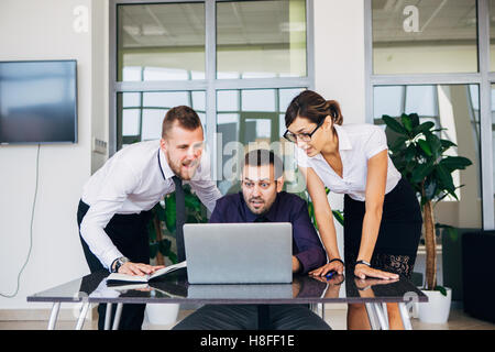Office workers using computers Stock Photo