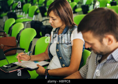 students listen to teachers lecture and ask questions Stock Photo
