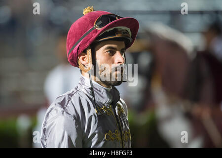 DOHA, QATAR - November 3rd 2016 Qatar Racing and Equestrian Club. Jockey Faleh Bughanaim in the parade ring before race 2 of the Stock Photo