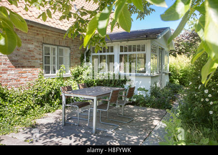 cottage, view to terrace and glazed veranda, the island of Rügen, Stock Photo