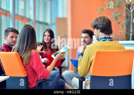 Group of young business professionals having a meeting. Stock Photo