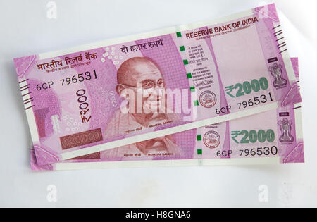 Goa, India. Saturday 12th November 2016. India's new 2000 rupee notes are in short supply. Canara bank in Goa was only allowing three per person and maximum withdrawal limit of 10,000 rupees ( about £120) per day as banks around the country ran out of cash. The government announced suddenly last week  that all previous high denomination notes ( 500 and 1000) could not be accepted in retail shops and businesses. Credit:  WansfordPhoto/Alamy Live News Stock Photo