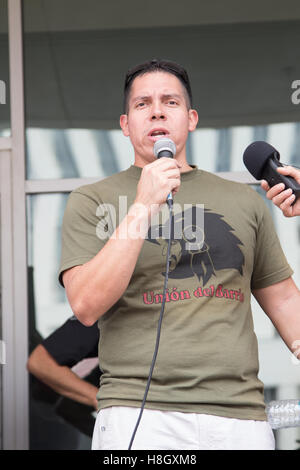 Los Angeles, California, USA. 12th November, 2016. Ron Gochez, organizer for Union del Barrio, addresses the crowd of anti-Trump protesters at the Federal Building in downtown Los Angeles.  Thousands of people marched through the streets of Los Angeles from MacArthur Park to the Federal Building in protest of Donald Trump becoming the new president of the United States. Credit:  Sheri Determan / Alamy Live News Stock Photo
