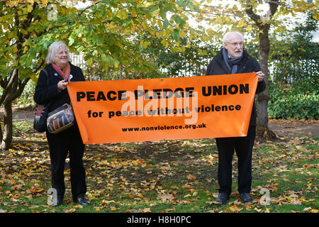 London, UK. 13th November, 2016. Peace Pledge Union to remember all victims of war of all nationalities, including civilians, conscientious objectors and members of armed forces. This is a chance to commit ourselves to peace and to resisting war at the conscientious objectors memorial in Tavistock Square,London,UK. Credit:  See Li/Alamy Live News Stock Photo